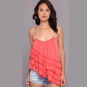 FREE PEOPLE flutter by asymmetrical Coral tank